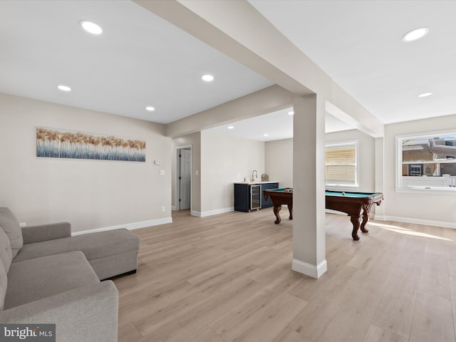 playroom featuring billiards and light hardwood / wood-style flooring