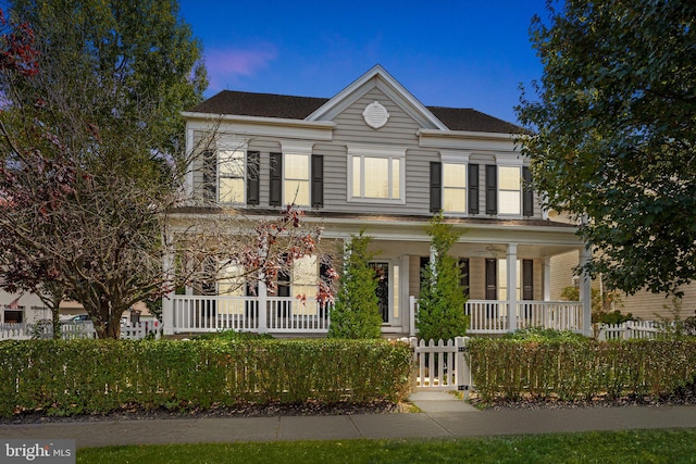 view of front of property featuring covered porch