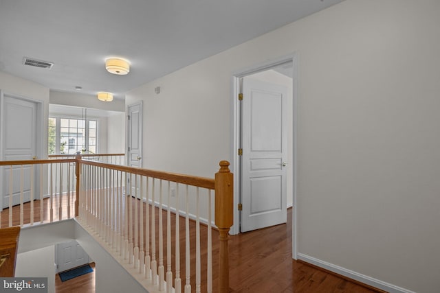 corridor featuring hardwood / wood-style flooring