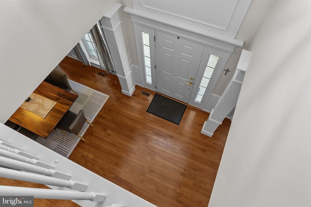 foyer with wood-type flooring