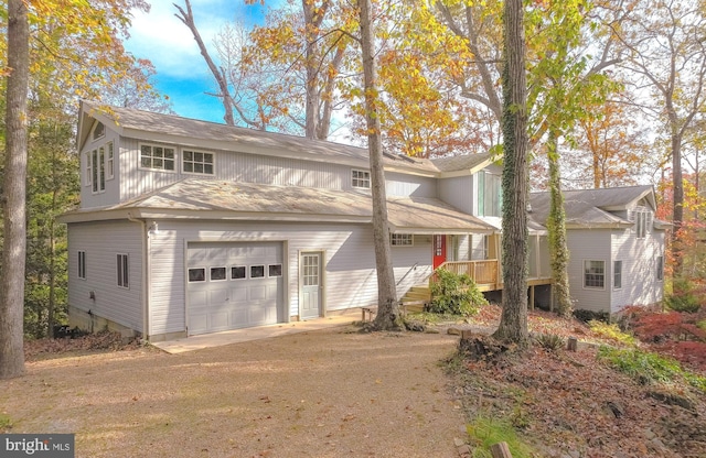 front of property with a garage