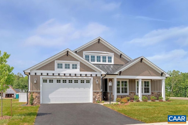 craftsman-style house with a front lawn