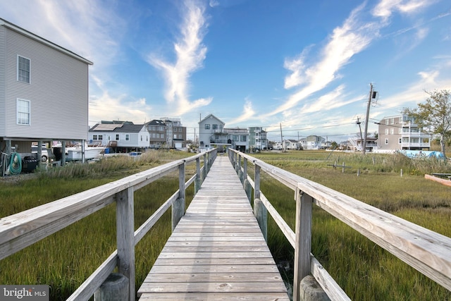 view of dock with a residential view