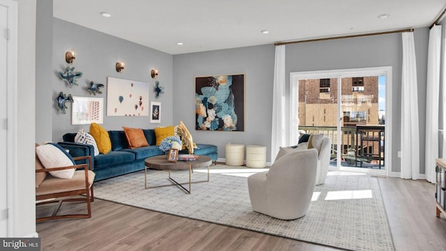 living room featuring light wood-type flooring