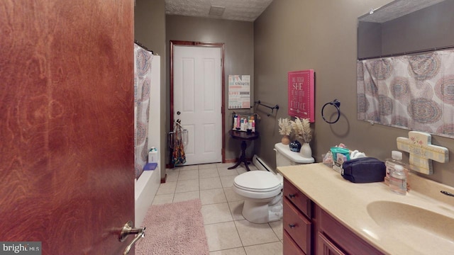 bathroom with tile patterned floors, toilet, a shower with curtain, vanity, and a textured ceiling