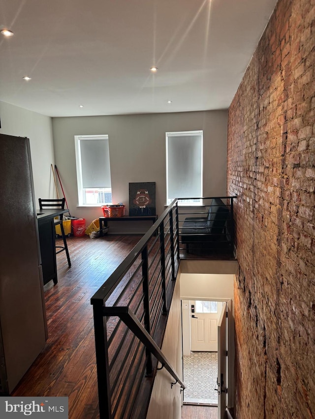 stairway featuring hardwood / wood-style flooring