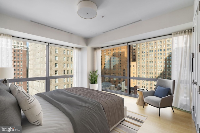 bedroom with light hardwood / wood-style flooring