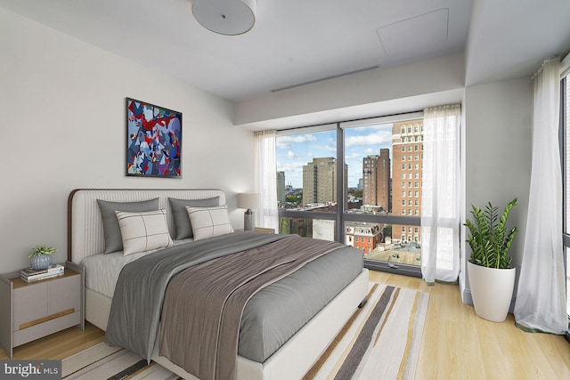 bedroom with light hardwood / wood-style floors