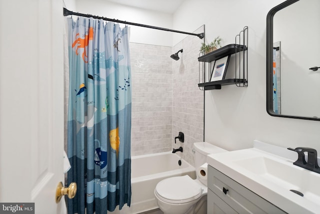 bathroom with toilet, shower / bath combo with shower curtain, and vanity