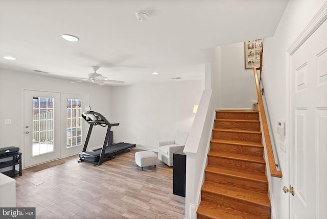 exercise area featuring recessed lighting, visible vents, ceiling fan, and light wood finished floors