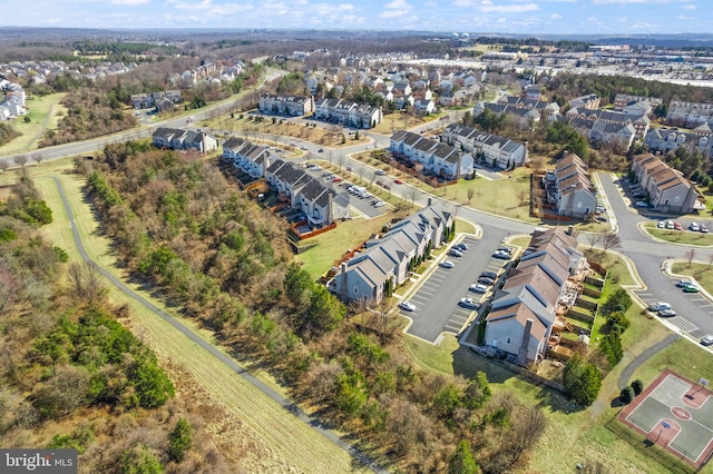 birds eye view of property with a residential view