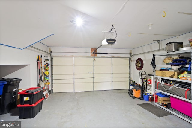 garage featuring a garage door opener