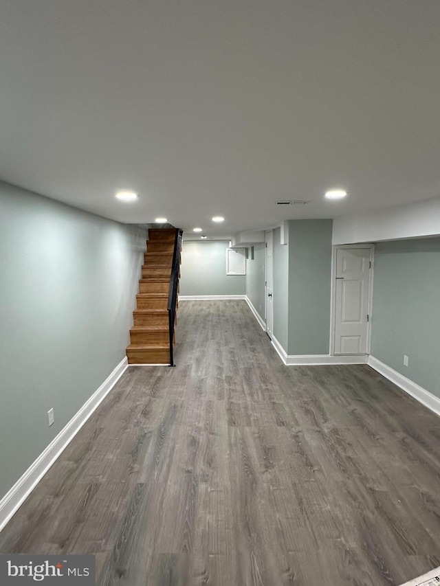 basement with wood-type flooring