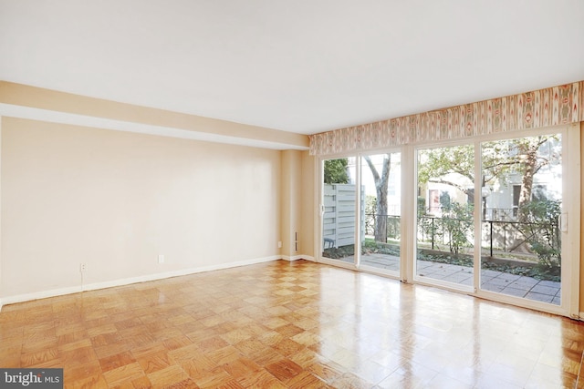 empty room with light parquet floors