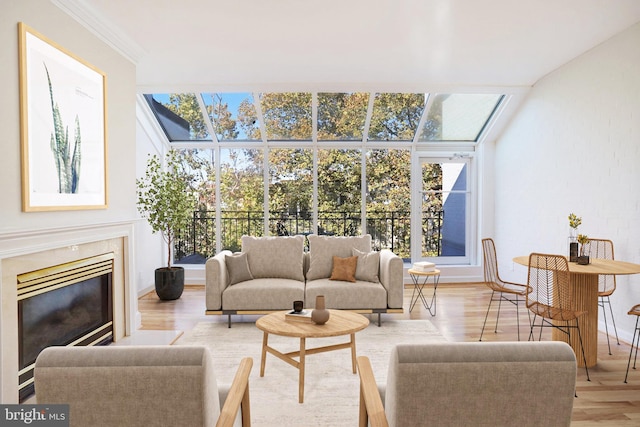 sunroom featuring a premium fireplace