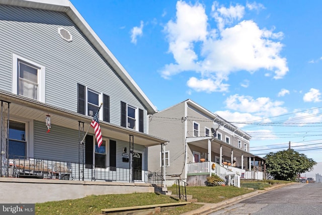 view of front of property featuring covered porch