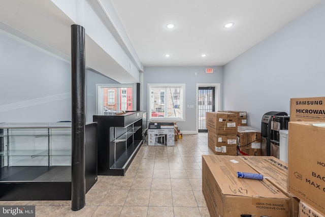 interior space with light tile patterned floors