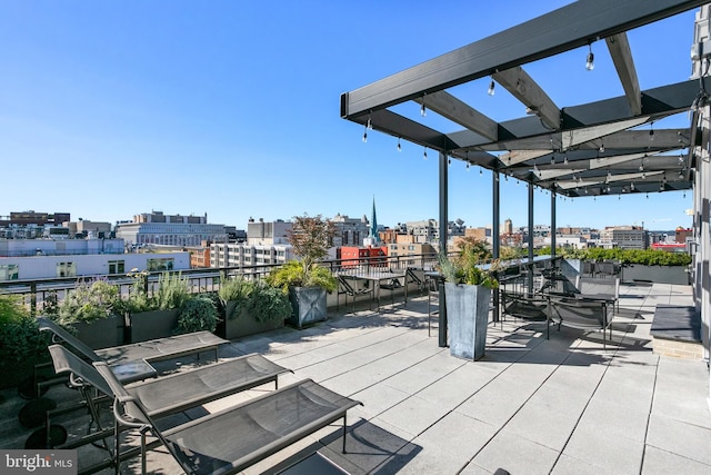 wooden terrace featuring a pergola