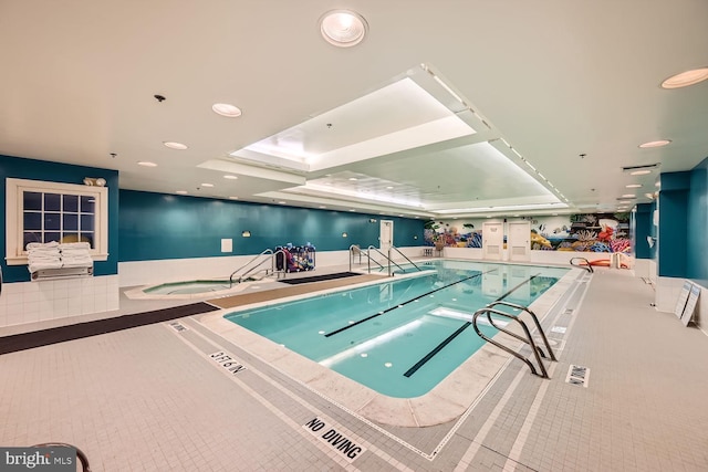 view of pool featuring an indoor hot tub