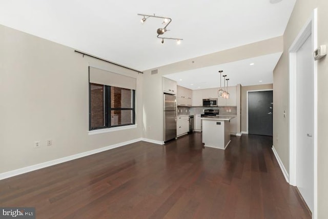 unfurnished living room with dark wood-type flooring