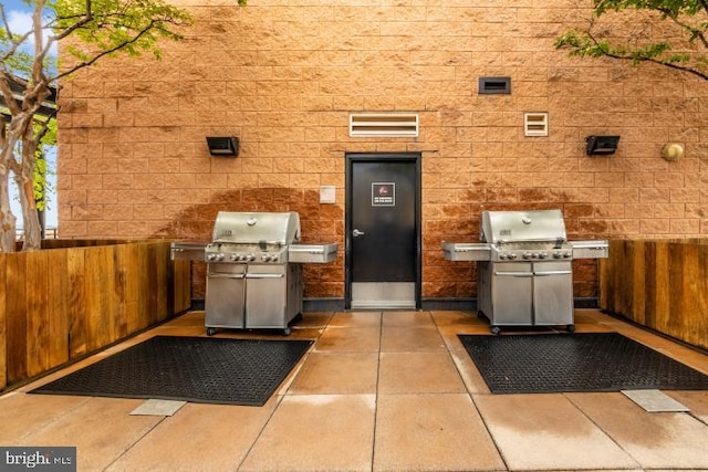 view of patio with a grill