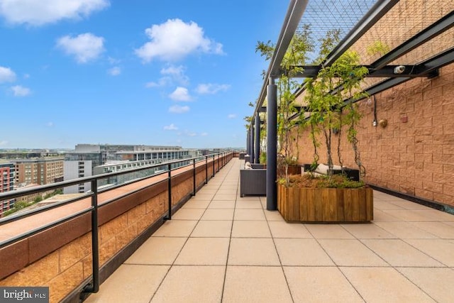 view of patio / terrace with a balcony