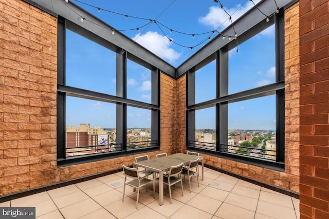 interior space featuring brick wall