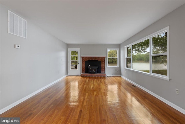 unfurnished living room featuring light wood-type flooring