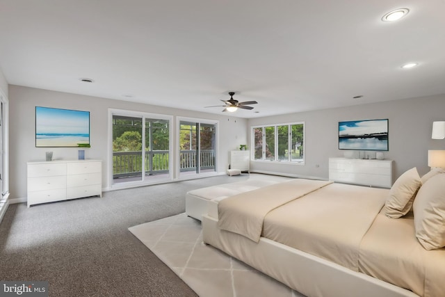 bedroom featuring light carpet and ceiling fan