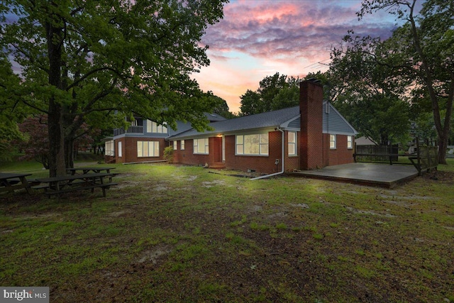 exterior space with a lawn and a patio area