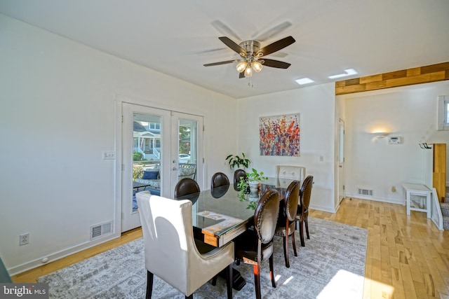 dining area featuring french doors, light hardwood / wood-style floors, and ceiling fan