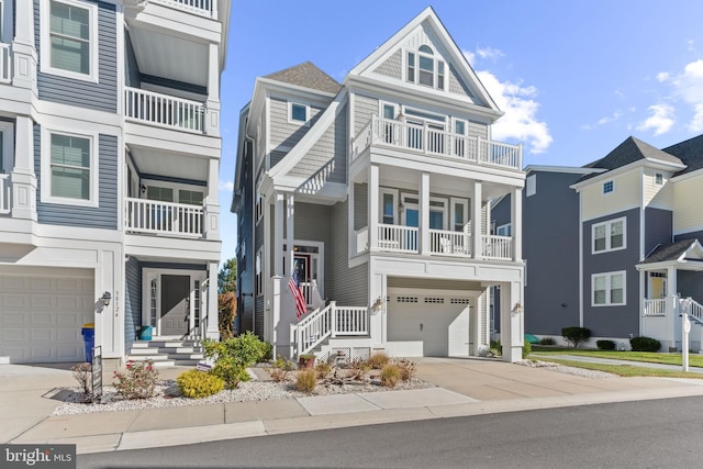 multi unit property featuring a garage and a balcony