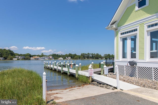 view of dock with a water view