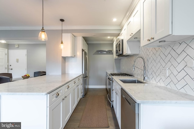 kitchen featuring sink, stainless steel appliances, light stone countertops, hanging light fixtures, and white cabinets