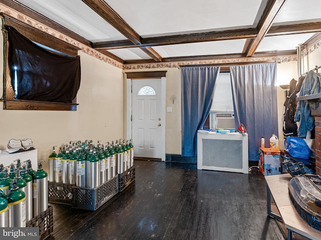 entryway featuring cooling unit, beamed ceiling, coffered ceiling, and dark hardwood / wood-style flooring