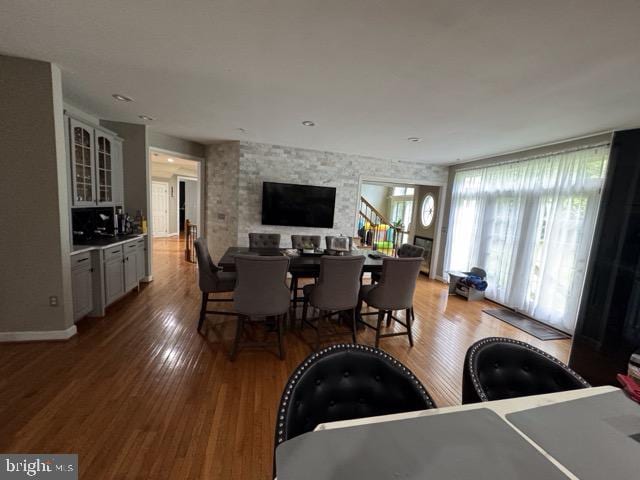 dining room with hardwood / wood-style flooring