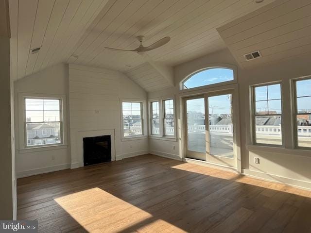 unfurnished living room featuring wood ceiling, ceiling fan, and dark wood-type flooring