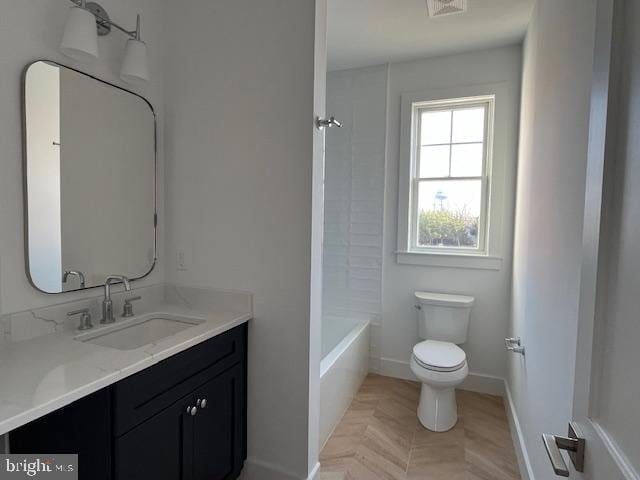 full bathroom with parquet flooring, bathtub / shower combination, vanity, and toilet