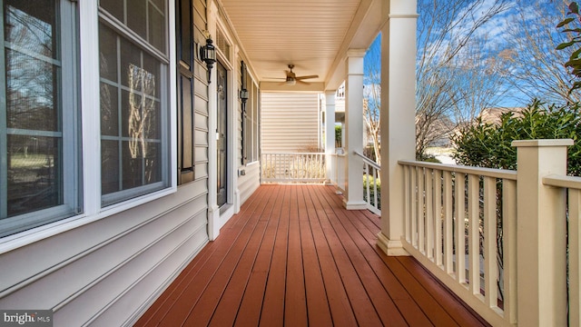 wooden terrace with ceiling fan