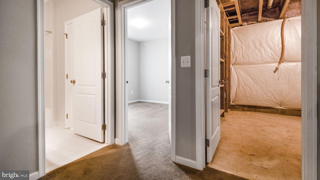 corridor with carpet floors