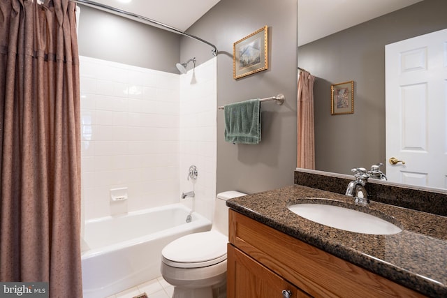 full bathroom with shower / bath combo with shower curtain, toilet, vanity, and tile patterned floors