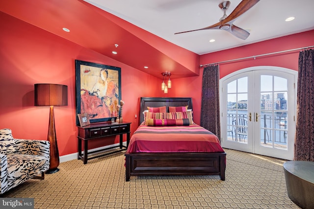 bedroom featuring french doors, access to exterior, light colored carpet, and ceiling fan