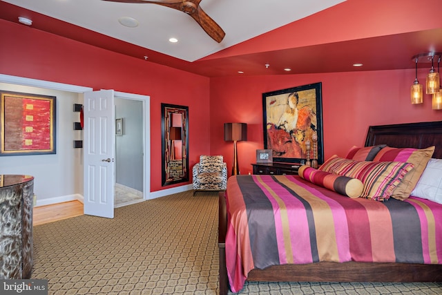 bedroom featuring ceiling fan, carpet flooring, and vaulted ceiling