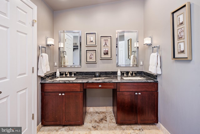 bathroom featuring vanity and vaulted ceiling