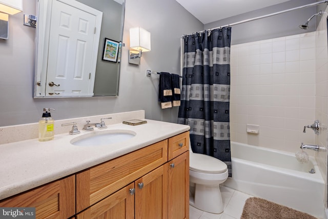 full bathroom featuring vanity, shower / bath combo, toilet, and tile patterned floors