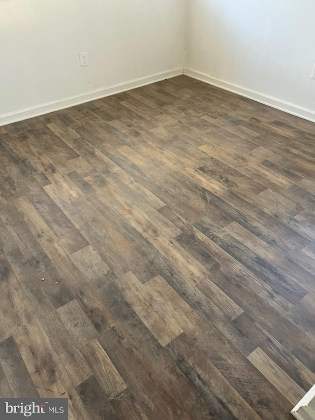 details with wood-type flooring