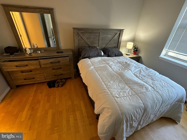 bedroom with light hardwood / wood-style flooring