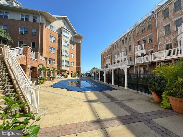 view of swimming pool featuring a patio