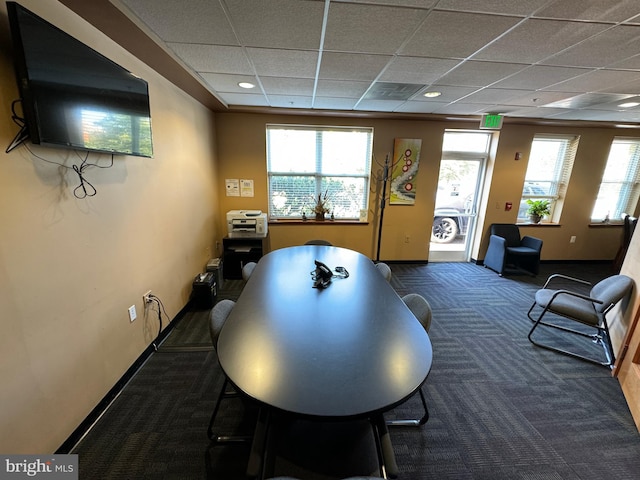 playroom with a drop ceiling and dark carpet