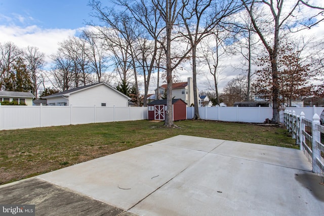 view of patio / terrace with a storage shed